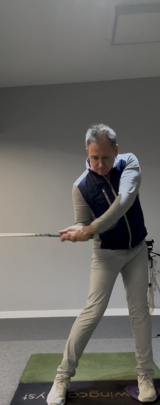 Lead leg extension and pelvis opening during downswing