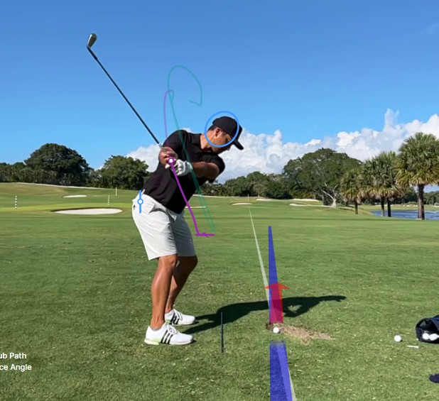 Tour player backswing frame with hand trail line and shaft orientation